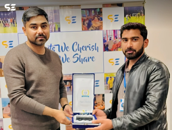 Employee receiving award